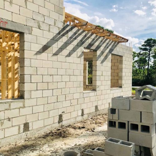 Trusses on top of the home under construction.