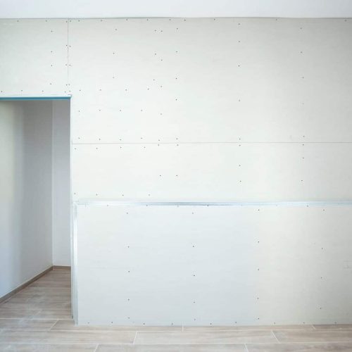 Wall made of plasterboard for a wardrobe in a house.